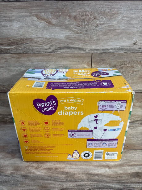Box of Parent's Choice baby diapers on wood background, featuring diaper features and size guide.