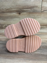 Bottom view of pink Cat & Jack kids shoes size 6 with non-marking soles on wood floor