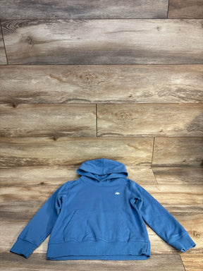 Blue kids hooded sweatshirt with front pocket, long sleeves, laid on wood background
