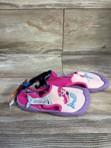 Side view of Newtz mermaid water shoes, pink and purple, embroidered mermaid and holographic tail strap on wood background