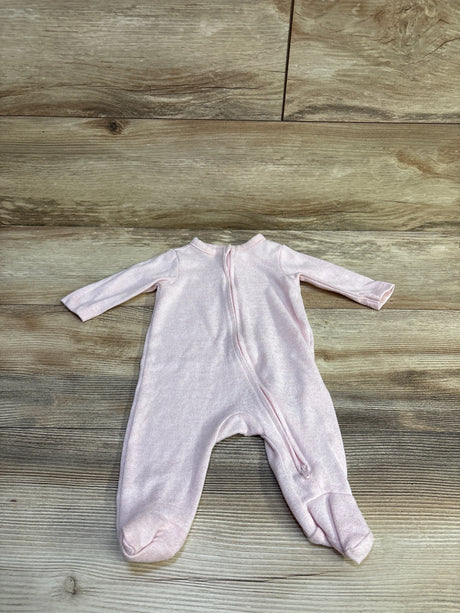 Flat lay of Old Navy knit footed sleeper showing pale pink knit fabric, front zipper, long sleeves on wood background
