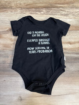 Black baby onesie with funny birth quote, perfect for newborns and new parents