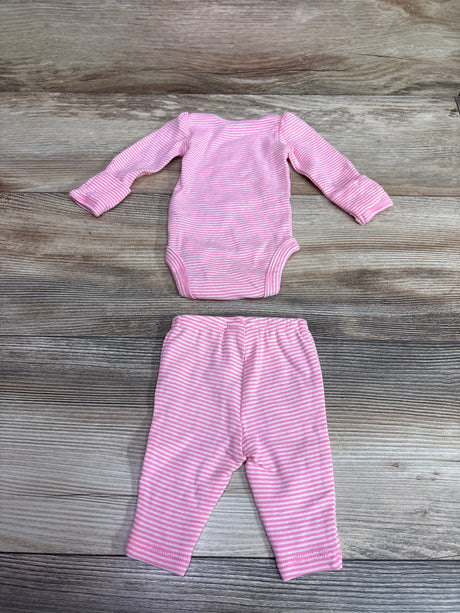 Top-down view of Simple Joys 2pc pink striped long-sleeve bodysuit and pants set in preemie size on wood-grain background