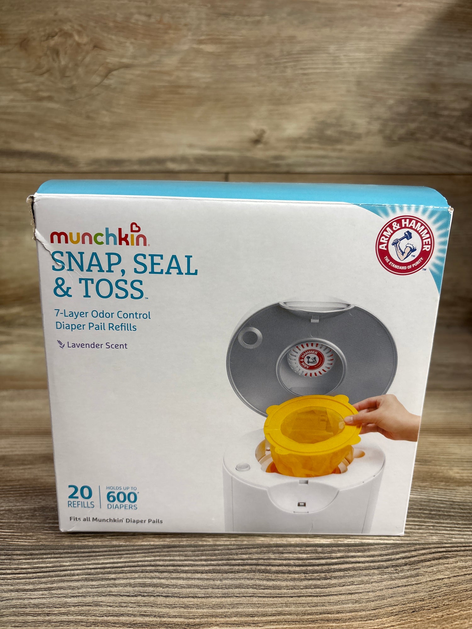 Munchkin STEP Diaper Pail, Powered by Arm & Hammer w/ Snap, Seal, & Toss Refills