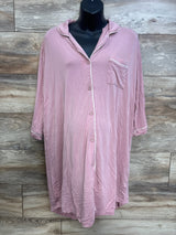 Front view of Caden Lane bamboo maternity nightgown in dusty pink, button front and chest pocket with white piping on wood