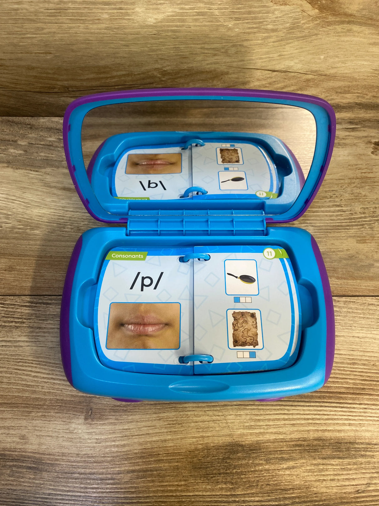 Speech therapy flashcard kit with mirror, showing consonant /p/ and mouth close-up