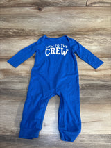 Blue baby onesie with 'New to the Crew' print, long sleeve newborn outfit on wood floor