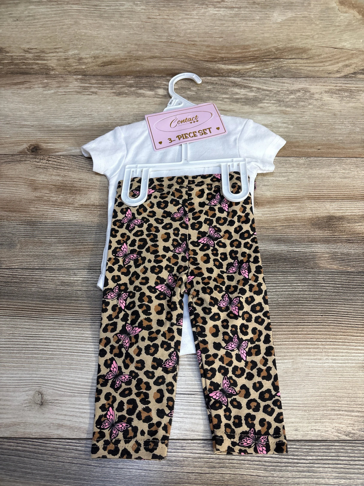 Baby 3-piece set with white top and leopard print pants featuring pink butterflies, ideal for kids' fashion.