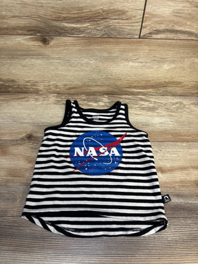 Kids black and white striped tank top with NASA logo, laid flat on wood floor.