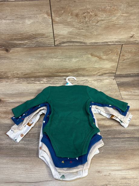 Back view of 4-pack long-sleeve baby bodysuits size 3-6M showing solid green top with blue and beige patterned bodysuits on a hanger over wood floor