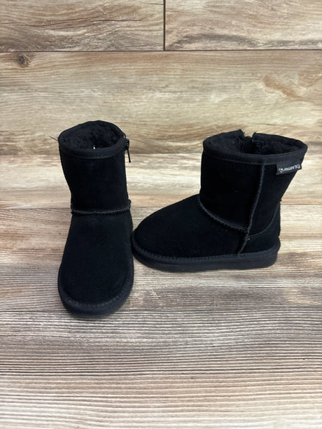 Front and side view of black BearPaw Eliza boots showcasing short shafts and side zipper on a wood-look floor