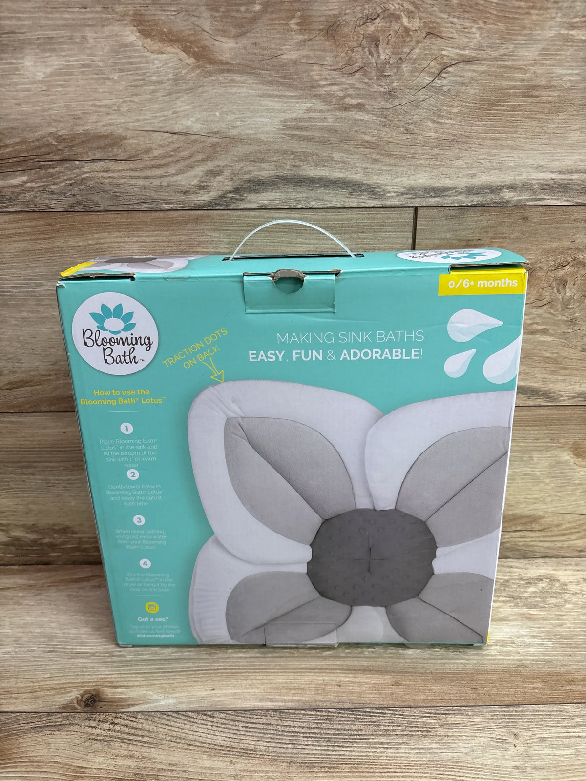 Packaging for the Me n Mommy To Be Blooming Bath Lotus Baby Bath Seat