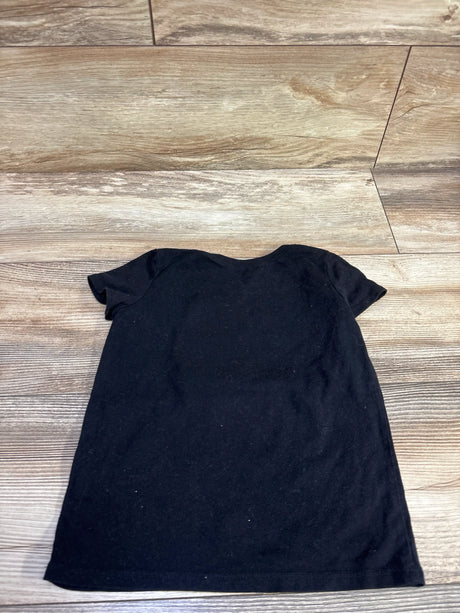 Back view of Children’s Place ABC’s shirt in black, size 5T, showing short sleeves on a wood-look floor