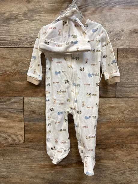 Flat lay of Kyle and Deena 2pc white sleeper and hat set showcasing farm animal print, full zipper, and footed design