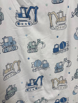 Top-down view of Tiny Adventures round baby playmat 36 x 36 in showing reversible construction vehicle print on white