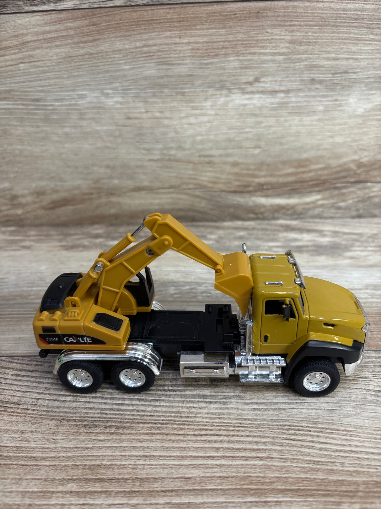 Pull-Back Excavator Truck