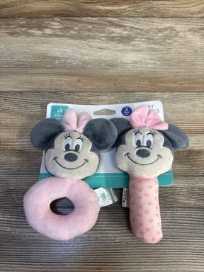 Front view of Disney Minnie Mouse two-piece plush rattles showing a pink ring rattle and a pink polka-dot stick on wood background
