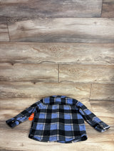 Blue and black plaid long sleeve fleece kids shirt on wooden surface