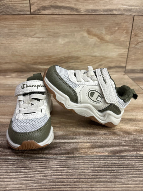Front and side view of Champion Hyper V2 Next sneakers in green and white showcasing mesh panels and textured soles