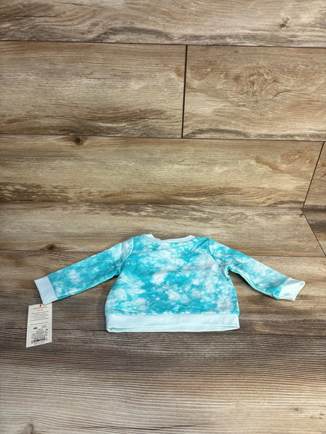 Newborn long sleeve blue tie-dye baby sweatshirt with tag, displayed on wood floor