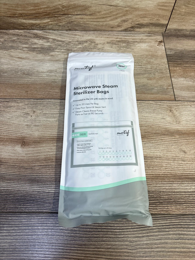 Top view of Motif 7-pack microwave steam sterilizer pouch showing front label (up to 20 uses) and use-count marks on wood background