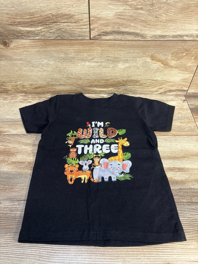Front view of black Gildan toddler 4T t-shirt showcasing I'm Wild and Three jungle animal print on wood floor background
