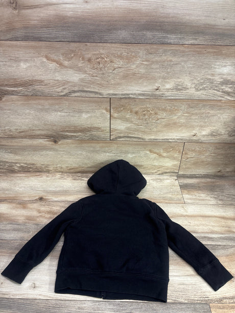 Back view of Gap Kids logo sherpa-lined zip hoodie in black, size 4 to 5, with hood on a wood floor