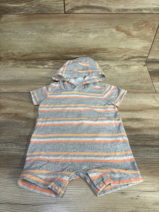 Front view of grey hooded shortie romper with peach and white stripes, short sleeves and crotch snap closures on wood background