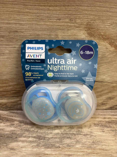 Front view of Philips Avent Ultra Air Nighttime 2-pack blue pacifiers for ages 6 to 18 months in a clear case