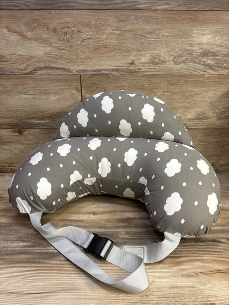 Front view of Momcozy Original Adjustable Nursing Pillow in Cloud Grey showcasing cloud pattern and adjustable strap on wood
