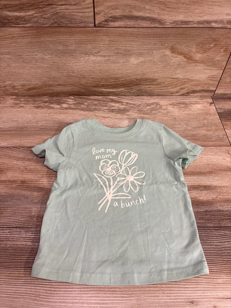 Light green Cat & Jack baby shirt with white floral design and 'love my mom a bunch!' text.