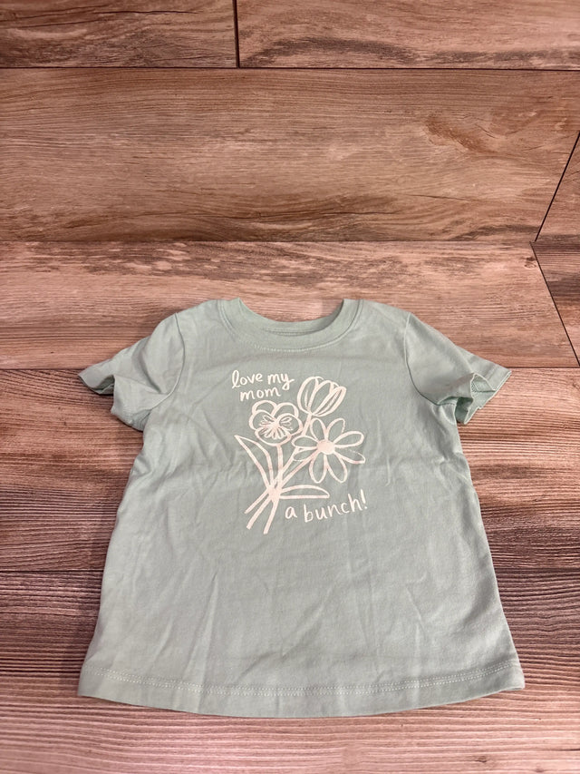 Light green Cat & Jack baby shirt with white floral design and 'love my mom a bunch!' text.