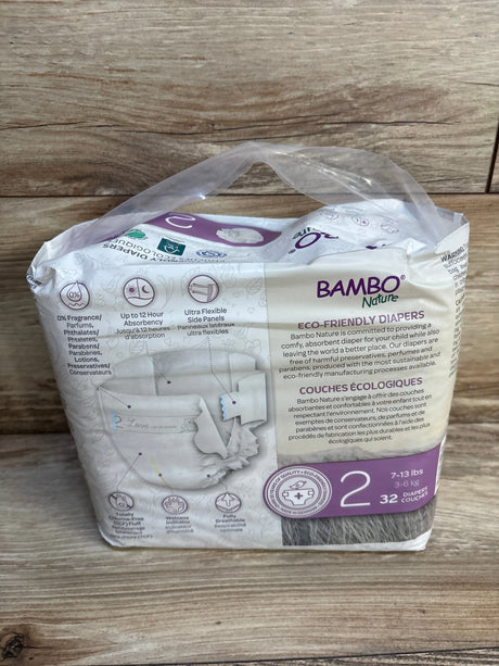 Bambo Nature eco-friendly diapers, size 2, 32 count, for 7-13 lbs, fragrance-free & breathable, on wood surface
