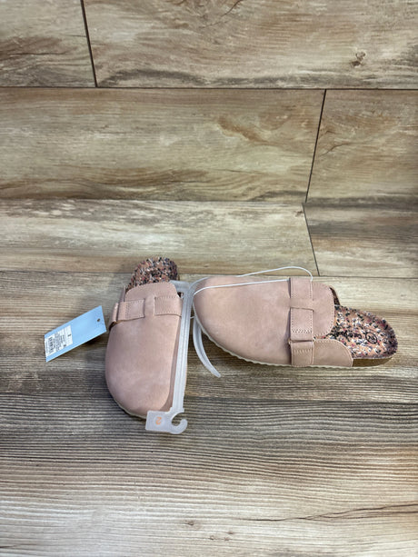 Top down view of Cat & Jack Perry toddler clogs in blush showcasing floral-print footbed, adjustable top strap and retail tag on wood floor