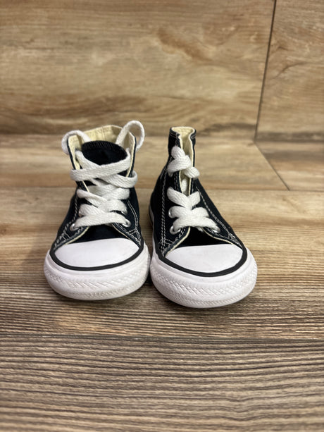 Front view of black Converse Chuck Taylor All Star high top sneakers in size 4C with white laces and rubber soles