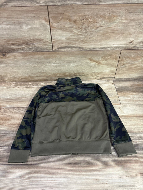 Nike camo full zip track jacket in green, size 3T, laid flat on a wooden background.