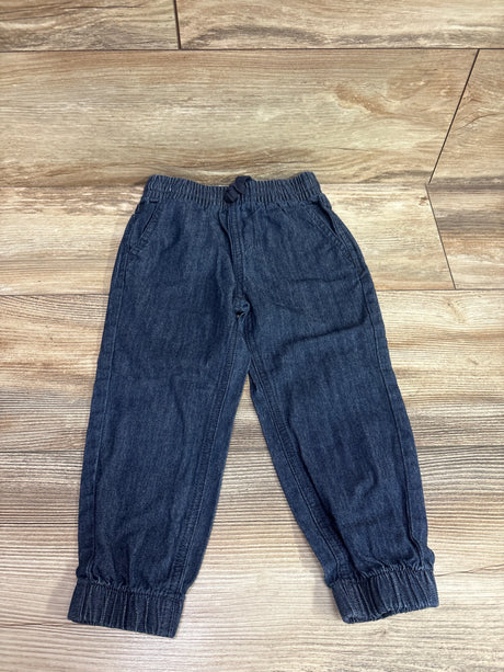 Front view of Pekkle chambray pull-on pants, blue size 3T, showing elastic waist and cuffed hems on wood-look floor