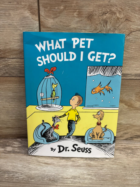 Front view of Dr Seuss What Pet Should I Get hardcover book showcasing illustrated pets on a wood surface