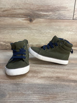 Olive green toddler high top sneakers with blue laces on wood background