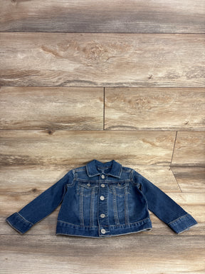 Kids denim jean jacket with long sleeves and button front on wood background