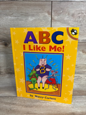 ABC I Like Me! children's book by Nancy Carlson with colorful animal characters on yellow star background