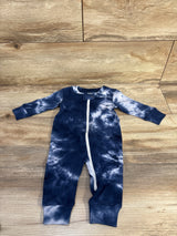 Flat lay of navy and white tie dye Owliviva organic footless sleeper with front zipper and cuffed legs on wood background