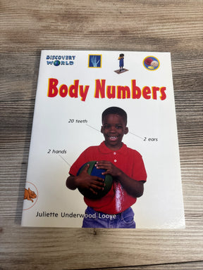 Children's educational book 'Body Numbers' featuring a smiling boy in red holding a ball