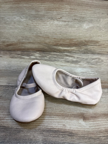 Light pink toddler ballet flats with elastic, gently used, on wood background