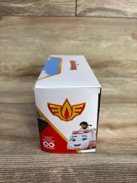 Kids toy packaging with cartoon ambulance and child character, on wood background