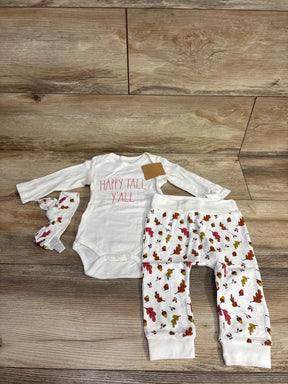 Baby fall outfit with 'Happy Fall Y'all' onesie, leaf-print pants, and matching headband on wood floor