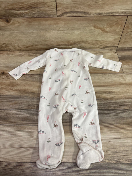 Top view of Just One You waffle knit sleeper, size 9 months, with long sleeves, footed legs, and animal print on wood flooring