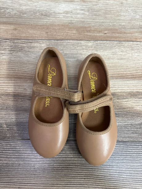 Top view of tan tap shoes size 9C with elastic Mary Jane straps and gold Dance Class insole on wood floor