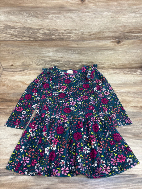 Front view of a Jumping Beans floral long sleeve dress with ruffled collar and gathered waist on a wood grain background