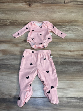 Pink baby outfit with black heart print, includes long sleeve bodysuit and footed pants